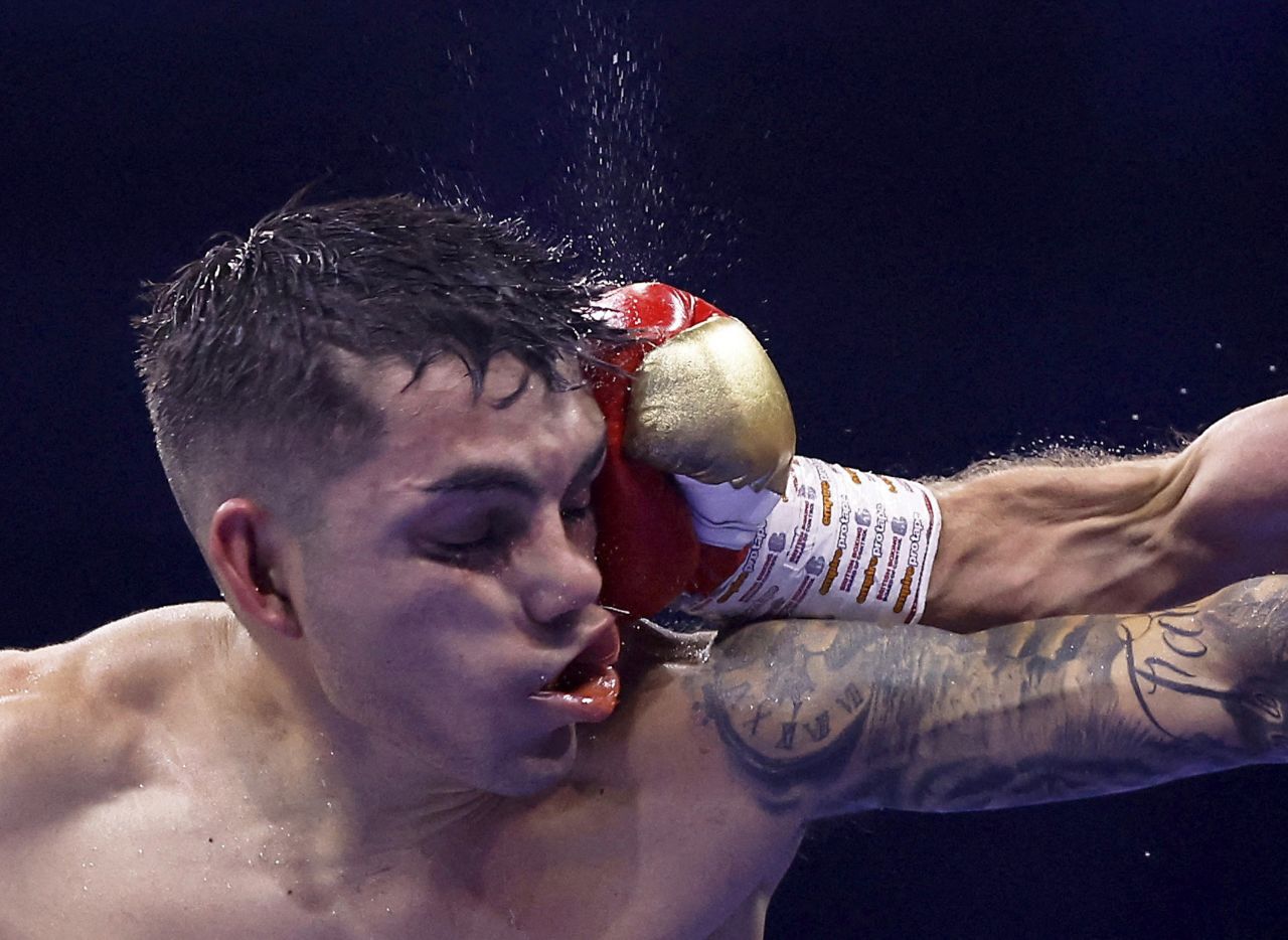 Andrés Campos is punched by Sunny Edwards during their world title bout in London on Saturday, June 10. Edwards won by unanimous decision to claim the IBF flyweight title.