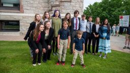 Montana's "climate kids" who are suing their state gather for a group photo before their case becomes the first climate-related constitutional challenge to make it to court.