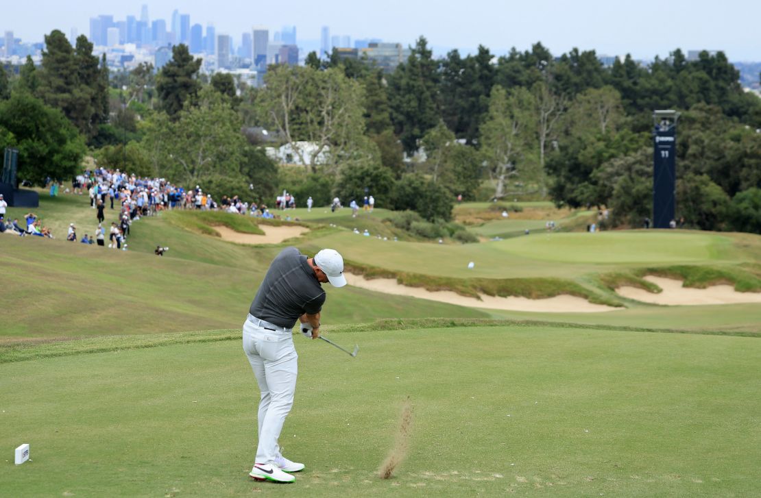McIlroy plays a shot on the 11th hole. 