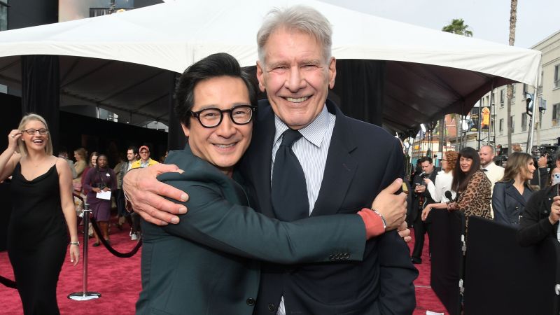 NextImg:Ke Huy Quan reunites with Harrison Ford on 'Indiana Jones' red carpet | CNN