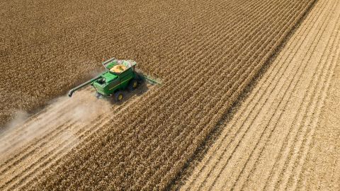 A combine tractor harvests corn in Leland, Mississippi, US, on Tuesday, Aug. 16, 2022. Corn was stable before a US crop tour that will give more insight into the state of fields in the worlds top producer. Photographer: Rory Doyle/Bloomberg via Getty Images
