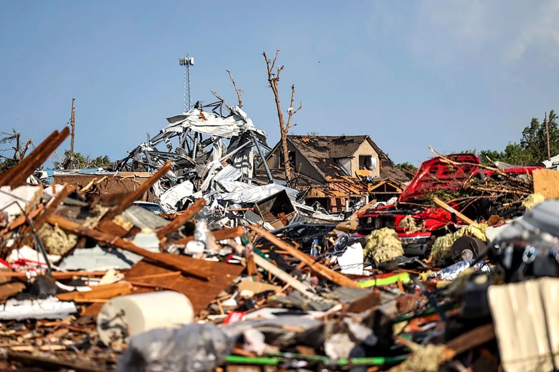 Debris covers a residential area in Perryton, Texas, after a tornado struck the area Thursday.