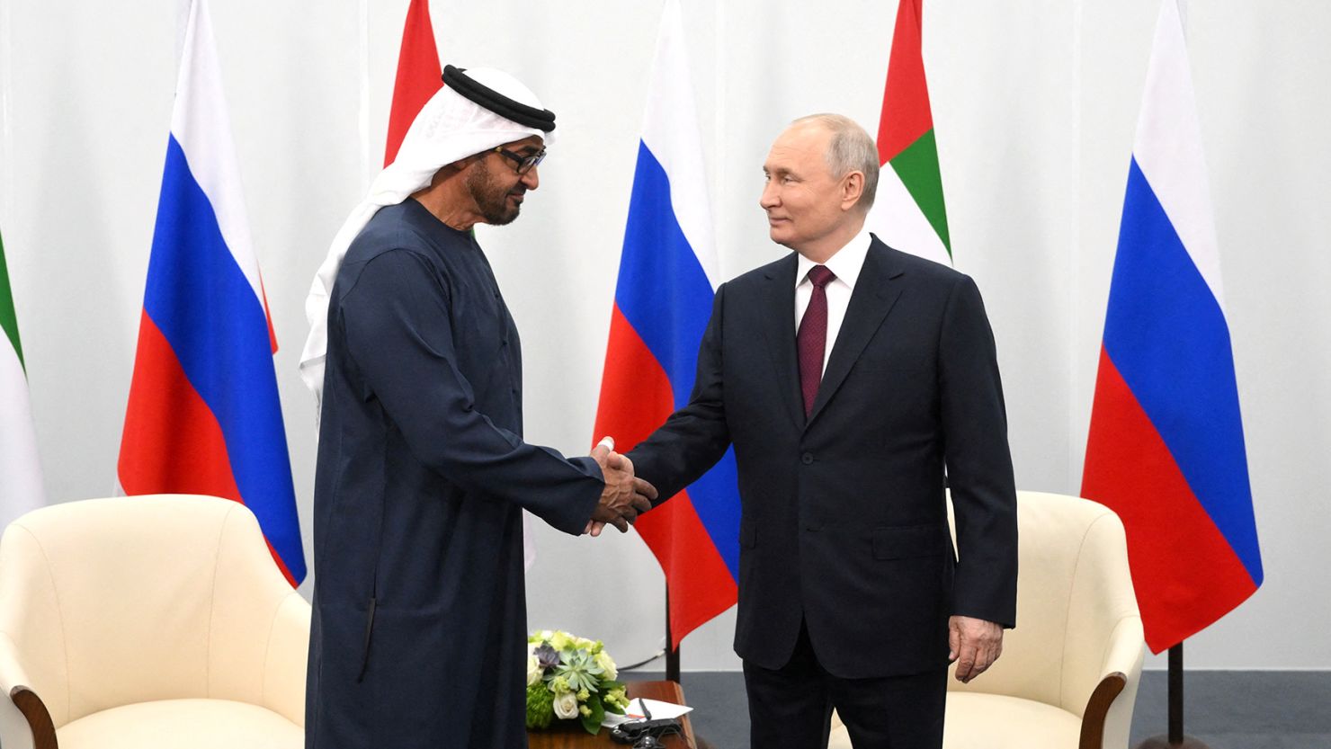 Russian President Vladimir Putin and President of the United Arab Emirates Sheikh Mohammed bin Zayed Al Nahyan shake hands during a meeting at the St. Petersburg International Economic Forum (SPIEF) in Saint Petersburg, Russia, on Friday.