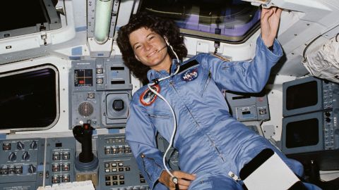 STS-7 mission specialist Sally Ride floats in the microgravity of low Earth orbit on the aft flight deck of the orbiter Challenger during STS-7 in 1983.