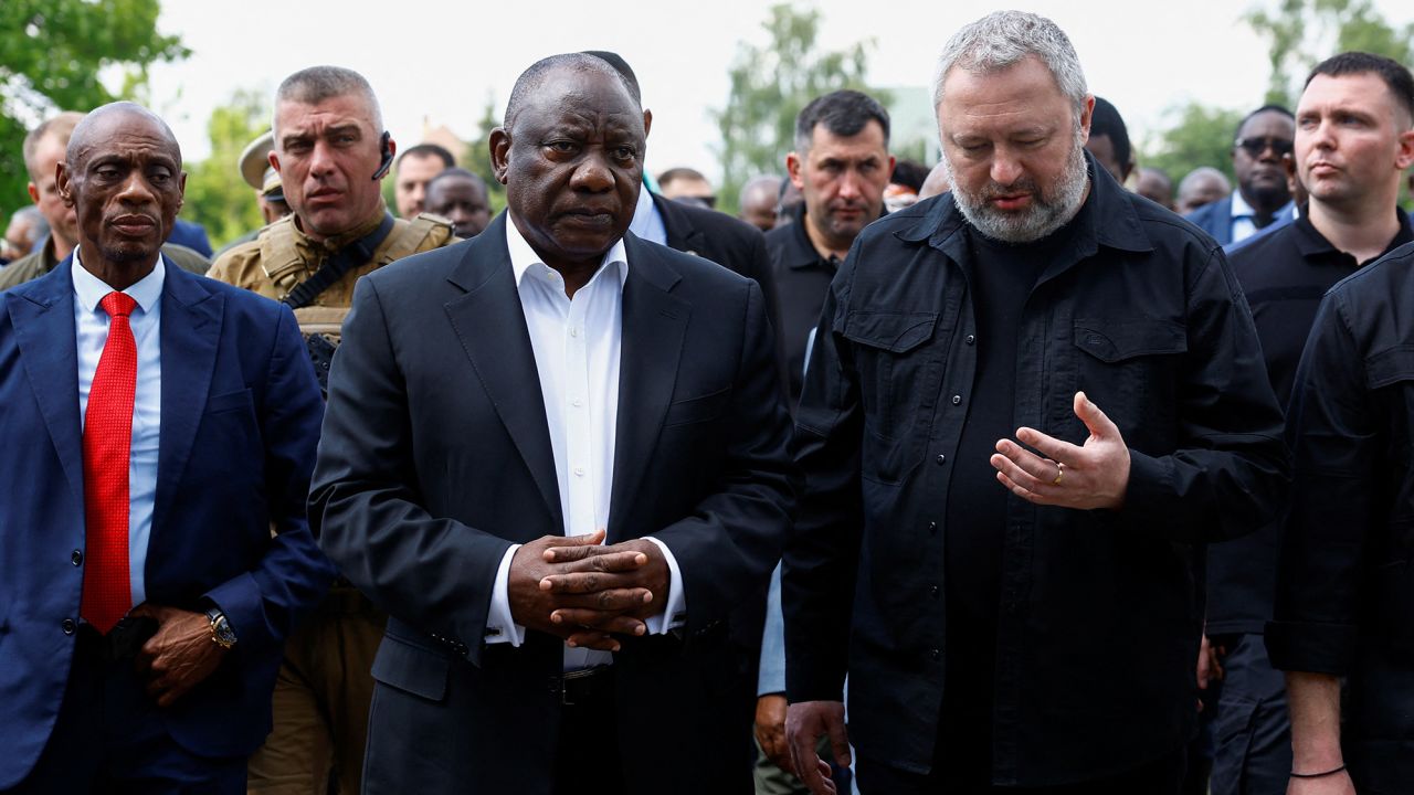 South African President Cyril Ramaphosa and Ukraine's Prosecutor General Andriy Kostin visit a site of a mass grave, in the town of Bucha, amid Russia's attack on Ukraine, outside of Kyiv, Ukraine June 16, 2023.