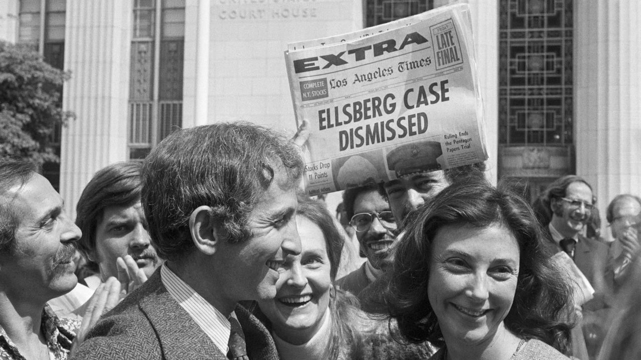 Daniel Ellsberg and wife walk from court after a federal judge has just dismissed the Pentagon Papers case against Ellsberg on May 11, 1973.