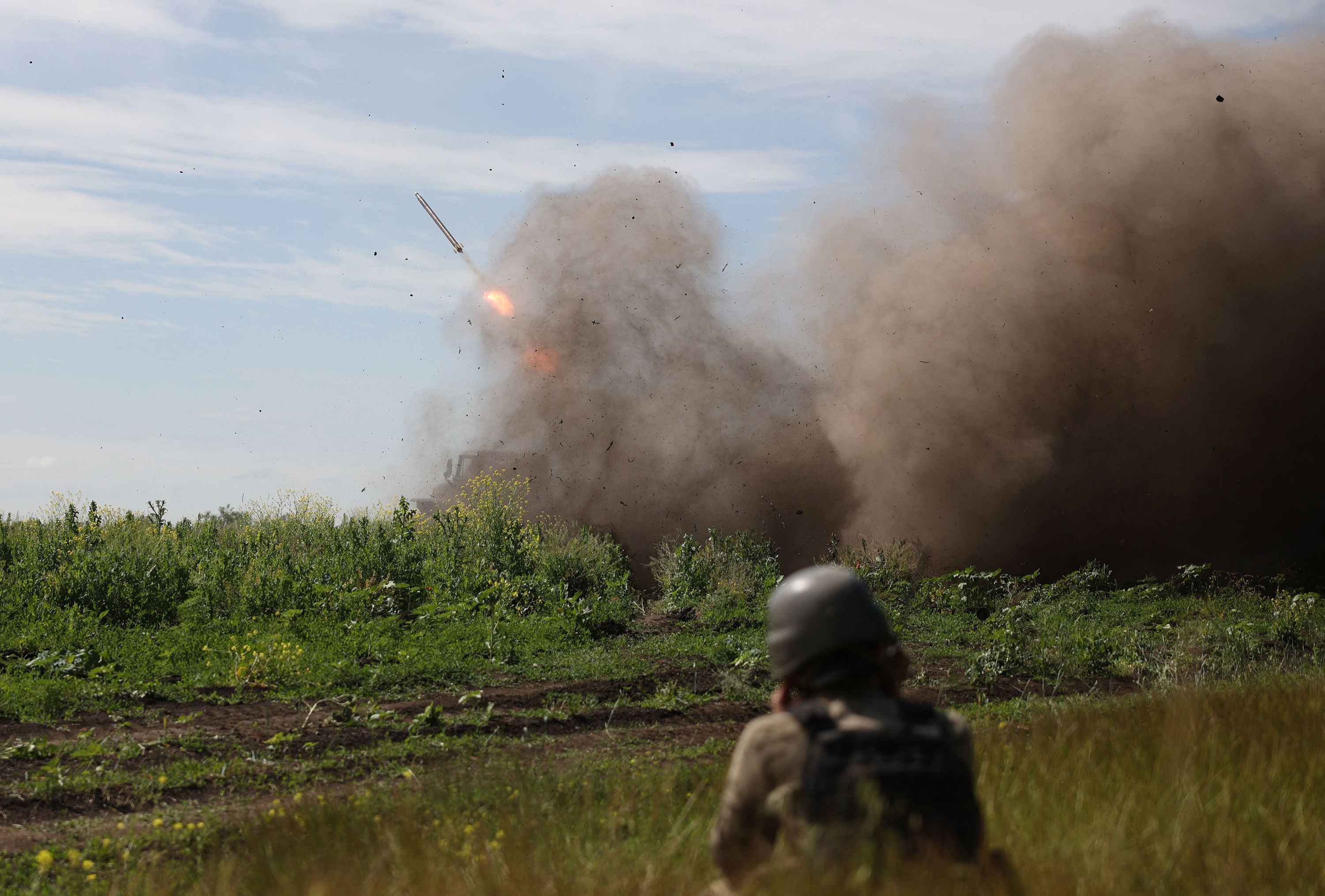 Ukrainian servicemen fire a BM-21 'Grad' multiple rocket launcher toward Russian positions near Bakhmut on June 13.