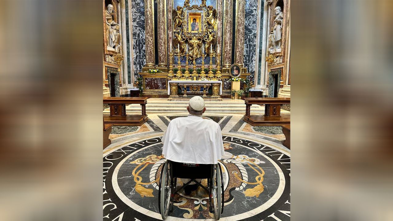 Pope Francis prays in front of the icon of Mary at the Basilica of Santa Maria Maggiore on Friday, after being released from hospital