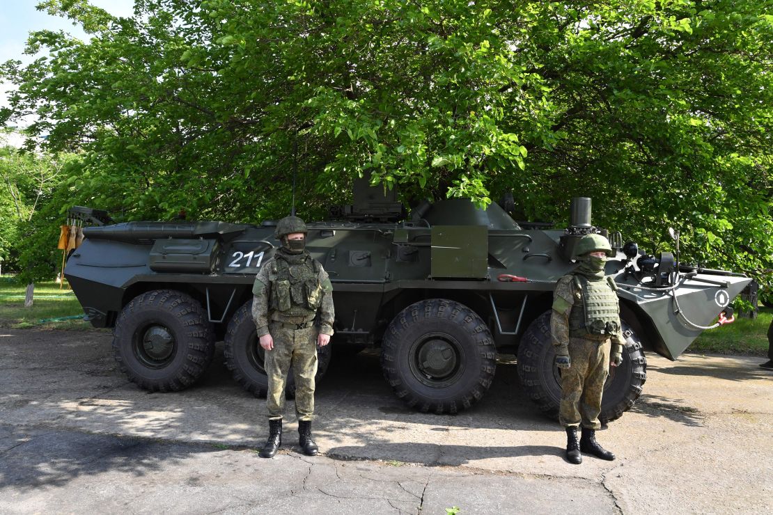 Russian servicemen stand guard near the Russian-controlled Zaporizhzhia nuclear power plant in southern Ukraine on June 15.