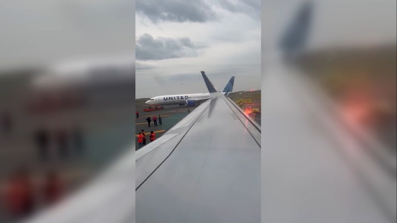 NextImg:Wing of United flight clipped tail of Delta plane at Boston airport, officials say | CNN