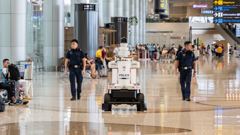 like-something-out-of-black-mirror-police-robots-go-on-patrol-at-singapore-airport-or-cnn