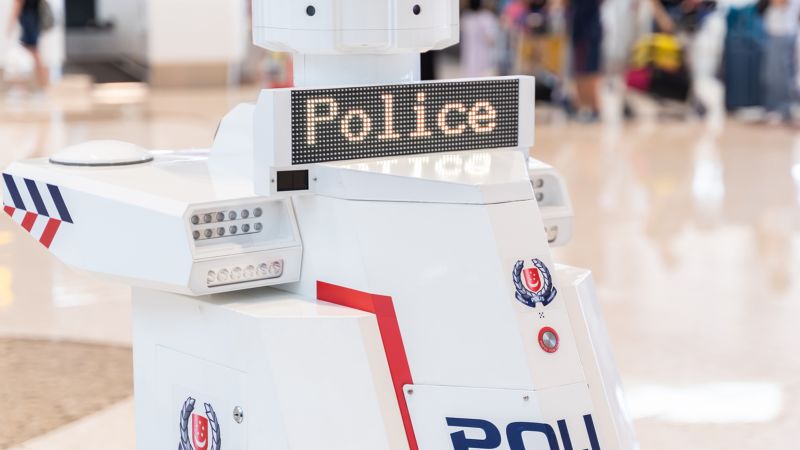NextImg:'Like something out of Black Mirror': Police robots go on patrol at Singapore airport | CNN