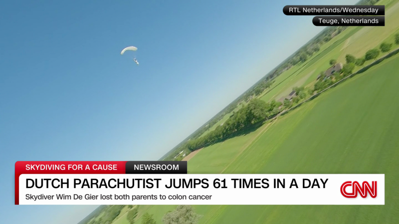 59-year-old Dutchman completes 61 parachute jumps in one day to raise money for cancer research | CNN