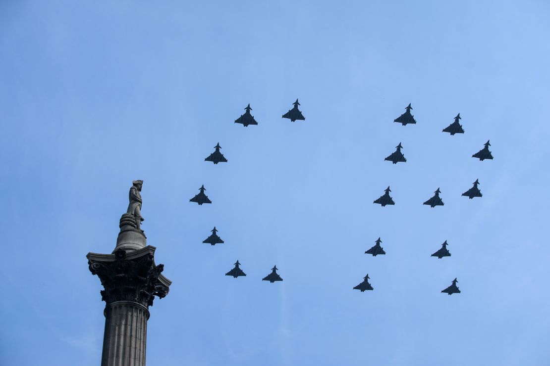 Typhoon fighter jets flew in formation, creating the monarch's monogram of "CR" in the sky - meaning "Charles Rex" or King Charles in latin.  