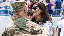 Republican presidential candidate Nikki Haley hugs her husband Maj. Michael Haley following a deployment ceremony for his unit of the South Carolina National Guard unit on Saturday, June 17, 2023, in Charleston, S.C. Michael Haley's year-long deployment to Africa will encompass much of his wife's campaign for the 2024 GOP presidential nomination.
