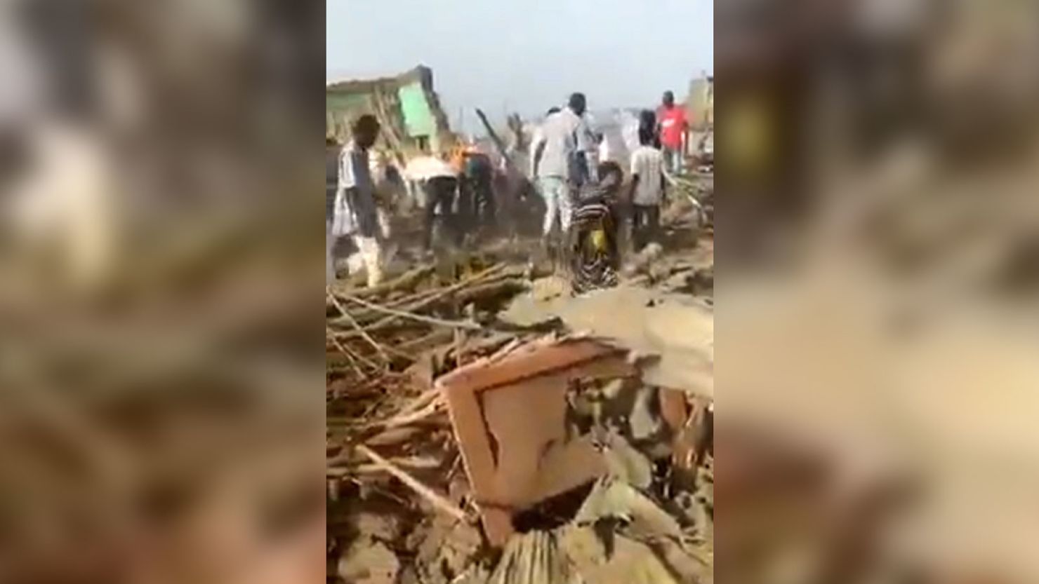 A still from a video shared by Sudan's health ministry shows the aftermath of an airstrike that killed 17 people, including five children, Saturday.