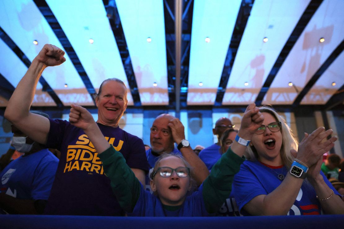 Supporters cheer before Biden speaks at the Pennsylvania Convention Center.