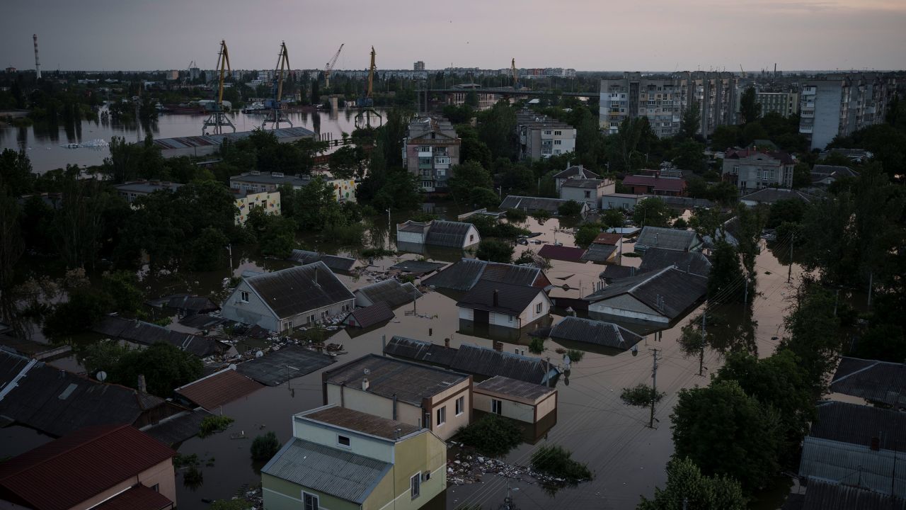Homes are seen underwater in a flooded neighborhood in Kherson, Ukraine, Wednesday, June 7, 2023. 