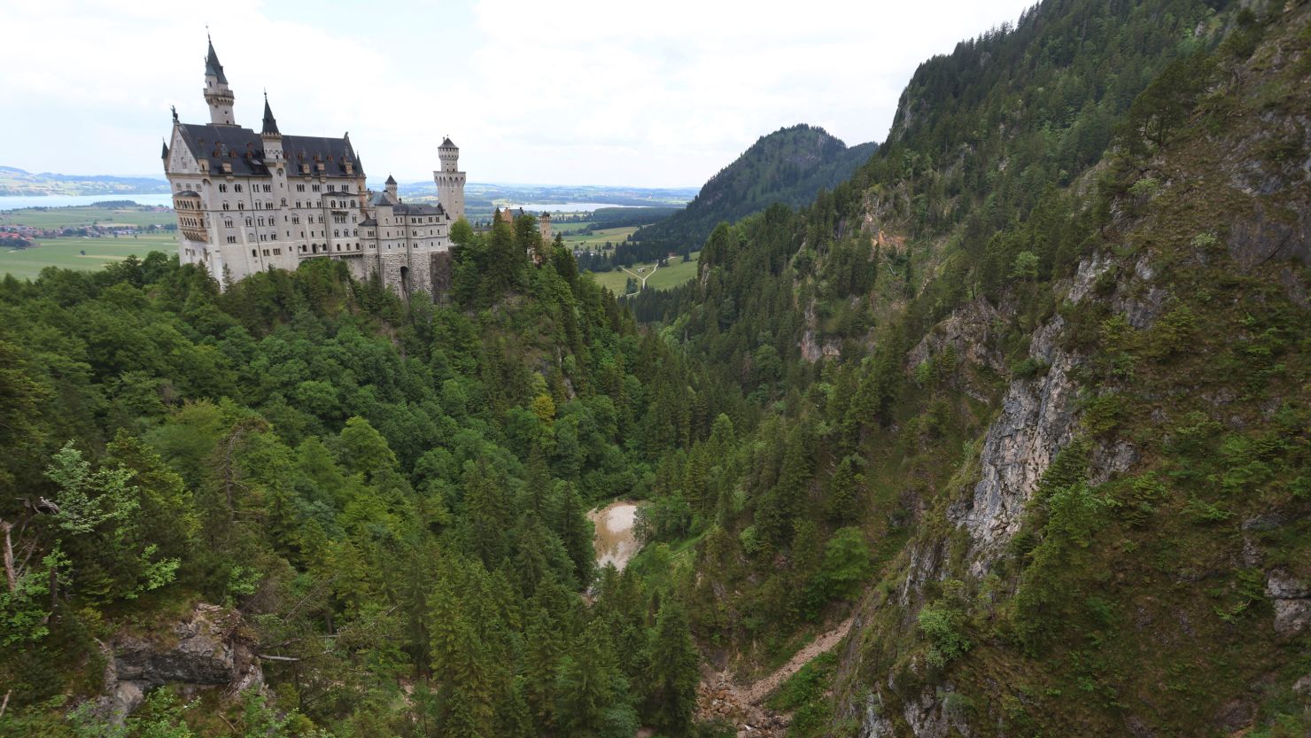 A view of the Pollat Gorge with the Neuschwanstein Castle, in background in Schwangau, Germany, on June 16.
