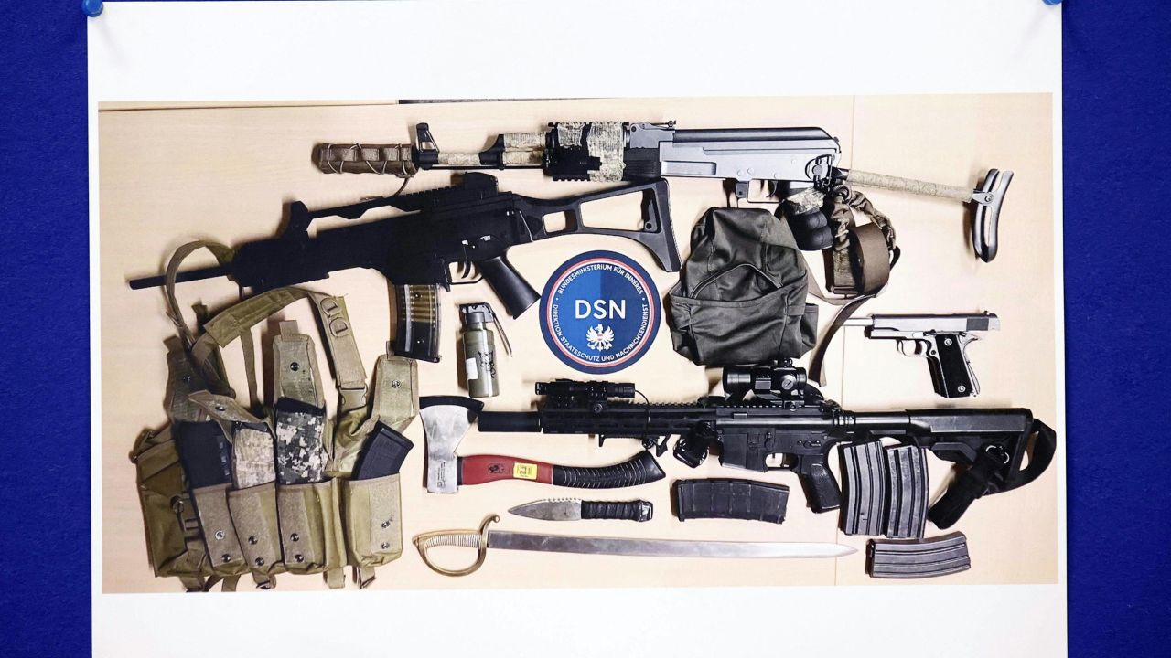 An image of the weapons confiscated is shown during the press conference. 