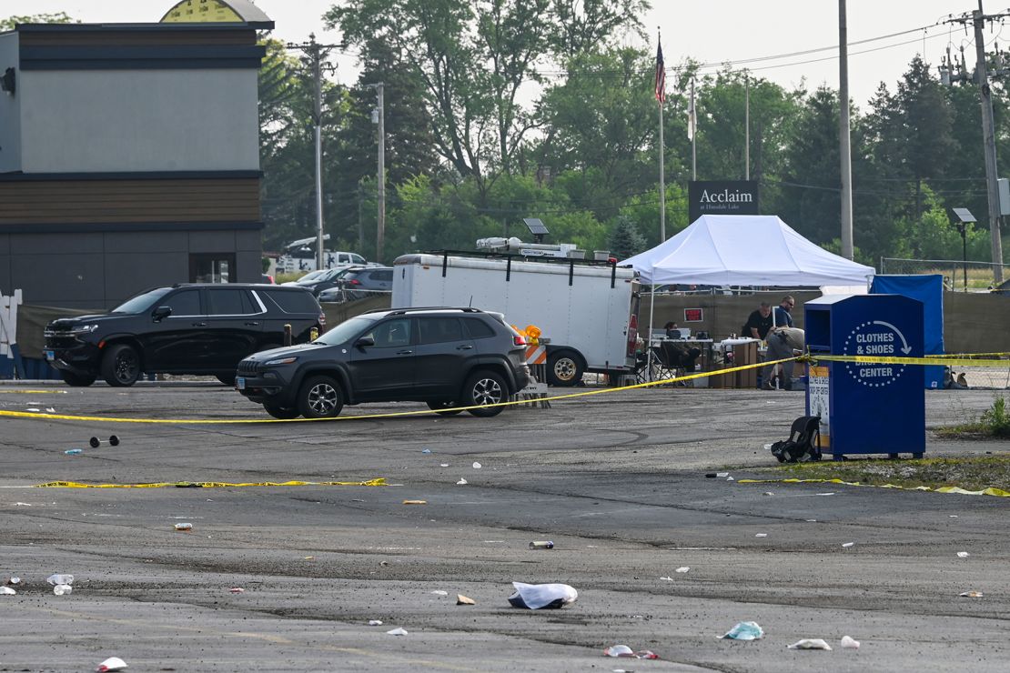 Investigators work the scene of the Willowbrook, Illinois, mass shooting.