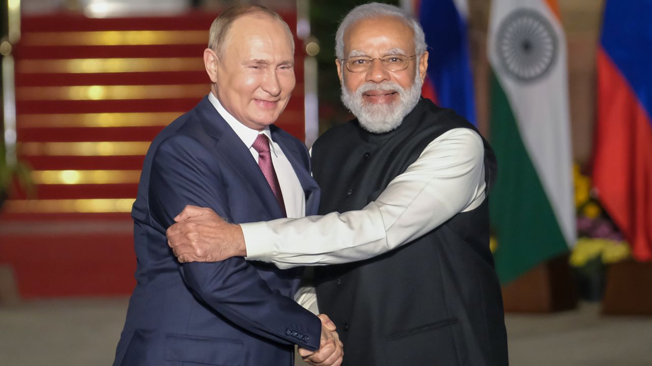 Modi and Russian President Vladimir Putin pose for photographs at Hyderabad House in New Delhi, India, on December 6, 2021. 
