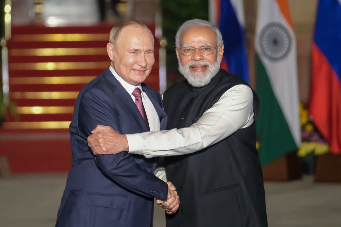 Modi and Russian President Vladimir Putin pose for photographs at Hyderabad House in New Delhi, India, on December 6, 2021. 