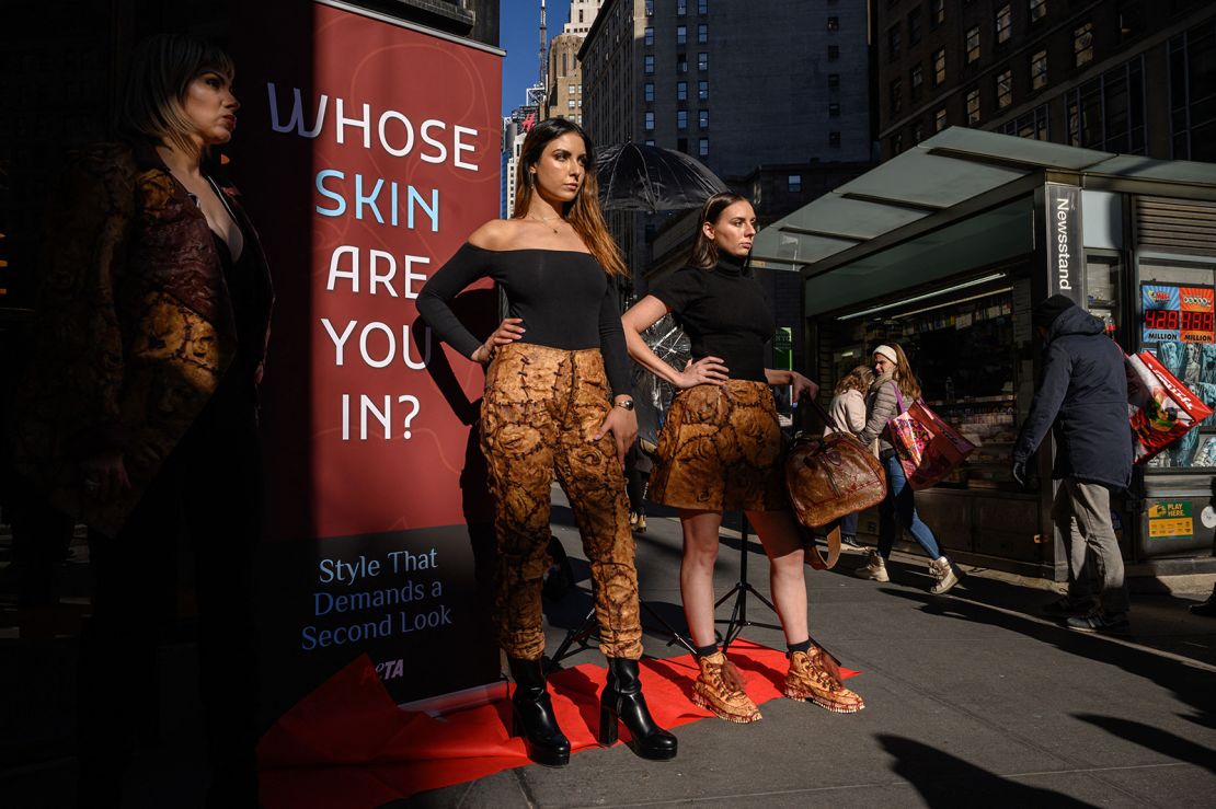 Animal rights activists from 'People for the Ethical Treatment of Animals' (PETA) stage a protest against the use of leather in clothing products, outside a Urban Outfitters in New York city on December 14, 2022. (Photo by Ed JONES / AFP) (Photo by ED JONES/AFP via Getty Images)