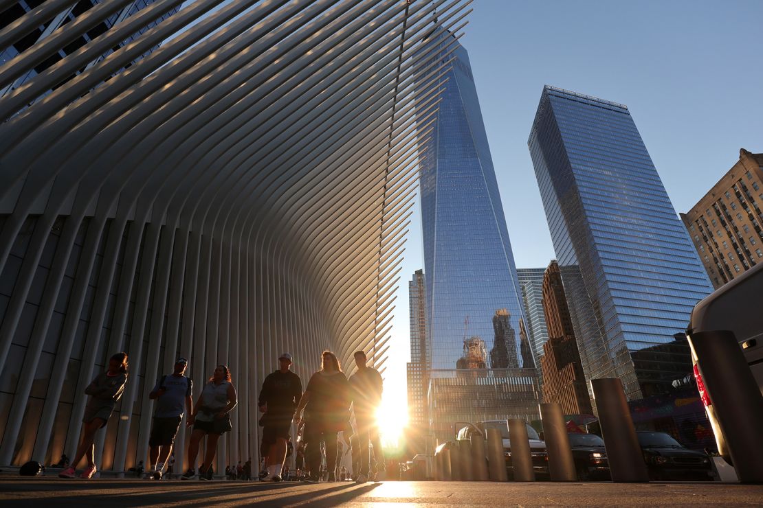 NEW YORK, NY - JUNE 21: The sun sets behind the Oculus transit hub and One World Trade Center on the summer solstice on June 21, 2019, in New York City. (Photo by Gary Hershorn/Getty Images)