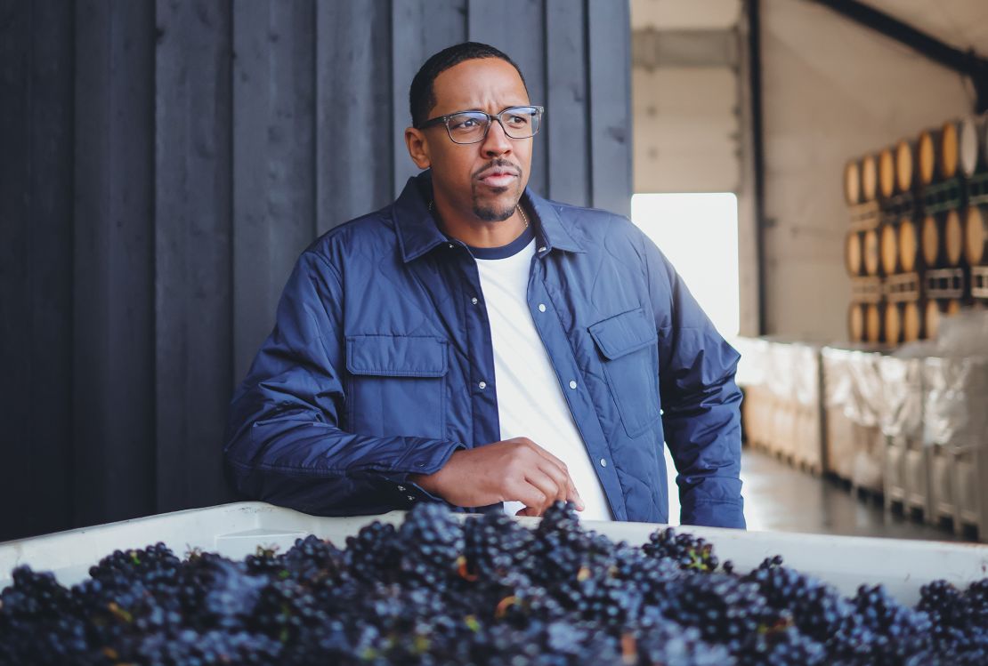 Former NBA player and owner of Chosen Family Wines, Channing Frye, tours Holstein Estate Vineyard where grapes are harvested for his company's wines.