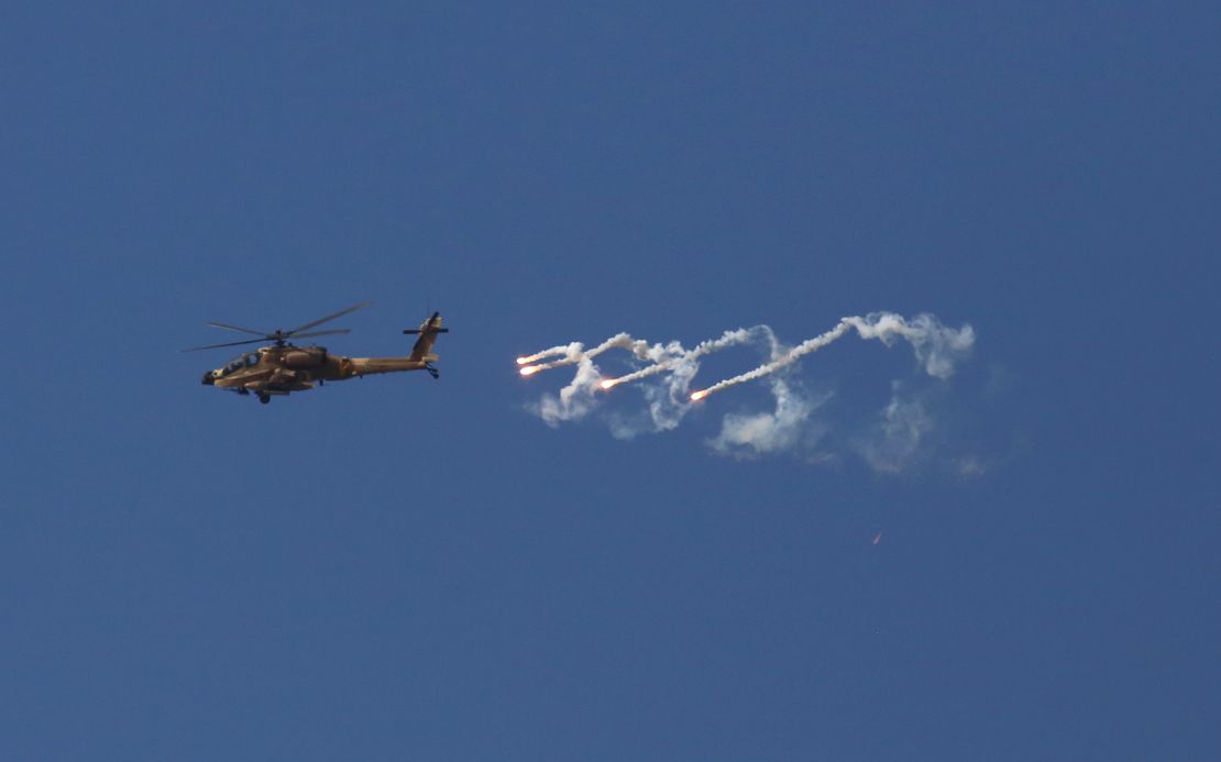 An Israeli military helicopter fires flares on Monday.