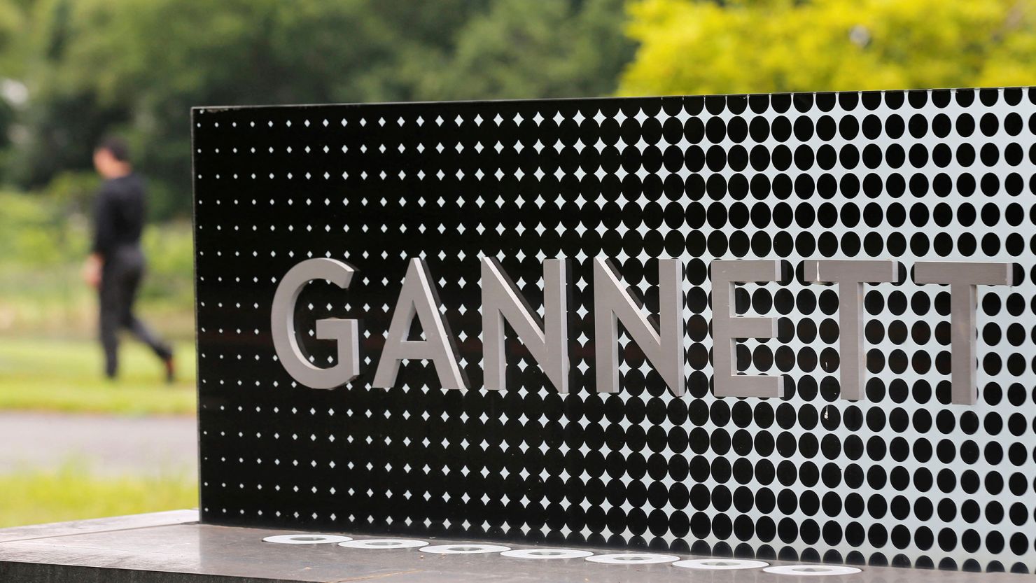 The logo of Gannett Co is seen outside their corporate headquarters in McLean, Virginia, July 23, 2013.  