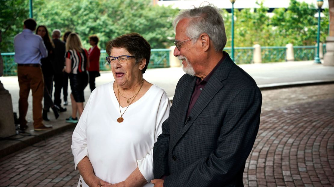 Barbara Caplan, left, and Stephen Cohen, co-presidents of the New Light Congregation, react June 16 to the guilty verdict.