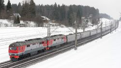 These are images from amateur Russian trainspotting websites, of Putin's train. The train is painted to look like an ordinary Russian Railways train. But according to The Dossier Center, it is identifiable by its use of two TEP70BS locomotives, and the tell-tale white antenna domes on one or two of the cars.