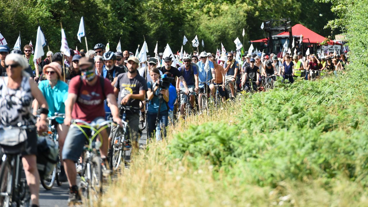 Members of Les Soulevements de la Terre protests the extraction of sand for industrial purposes, on June 11, 2023.