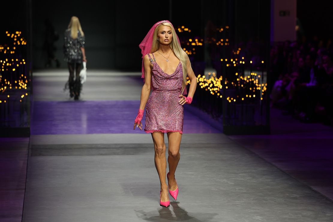 Paris Hilton walks the runway during Versace's Spring-Summer 2023 show on September 23, 2022 in Milan.