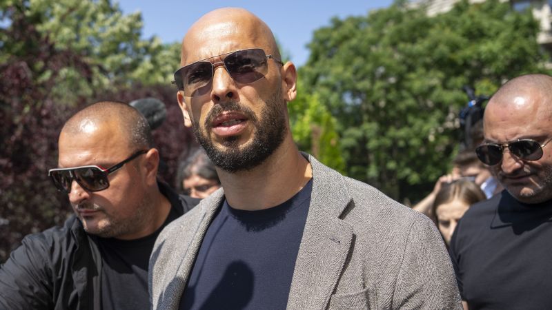 Andrew Tate: Controversial influencer arrives at Bucharest court alongside his brother