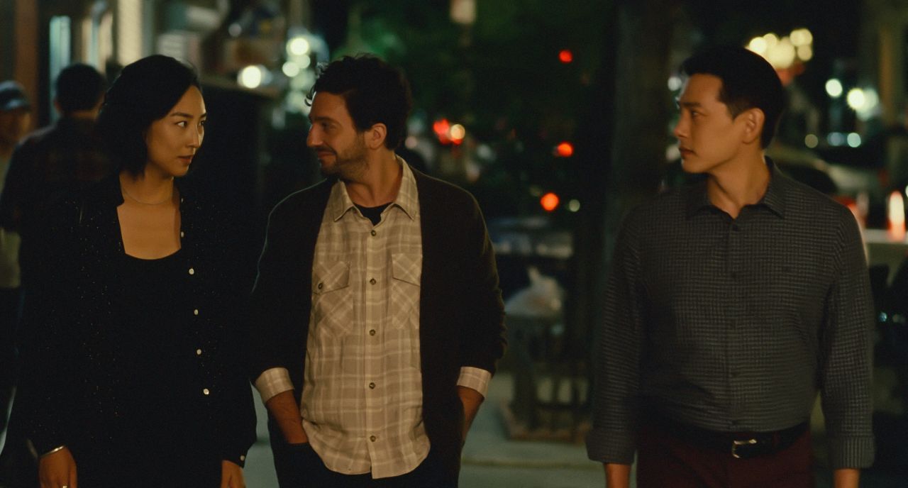 Greta Lee, John Magaro and Teo Yoo in "Past Lives." The film forgoes the need for a bad guy in its romantic drama. "It’s really about three adults doing their best to behave as adults," said  Lee.