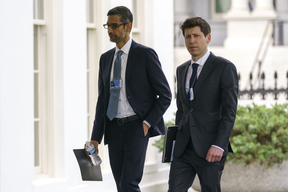 Alphabet CEO Sundar Pichai, left, and OpenAI CEO Sam Altman arrive to the White House for a meeting with Vice President Kamala Harris on artificial intelligence, Thursday, May 4, 2023, in Washington.