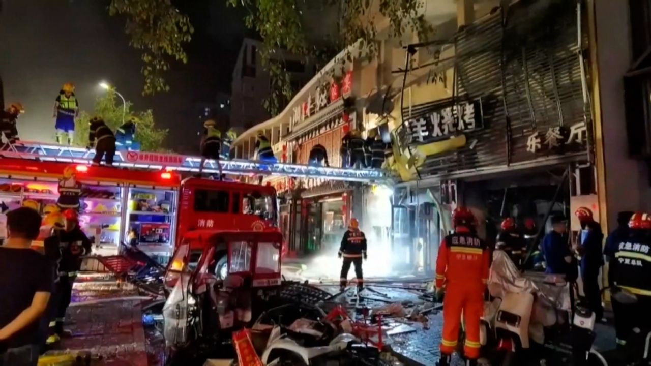 Emergency workers respond to a gas explosion at a barbecue restaurant in Yinchuan, Ningxia, China, on June 21.