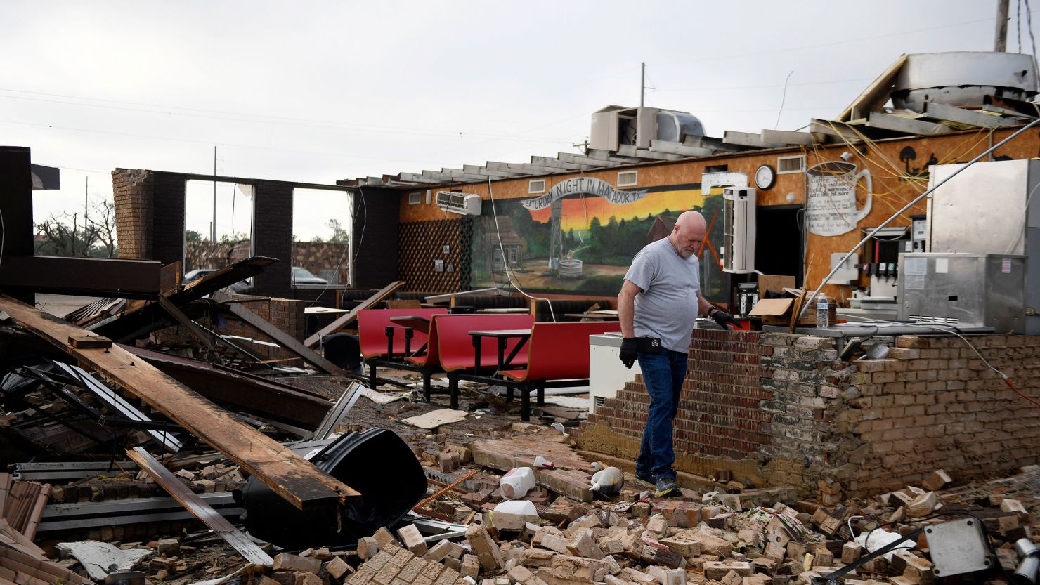 Pat Smith looks through his restaurant, Matador Diner, after a tornado in Matador, Texas, on June 22, 2023.