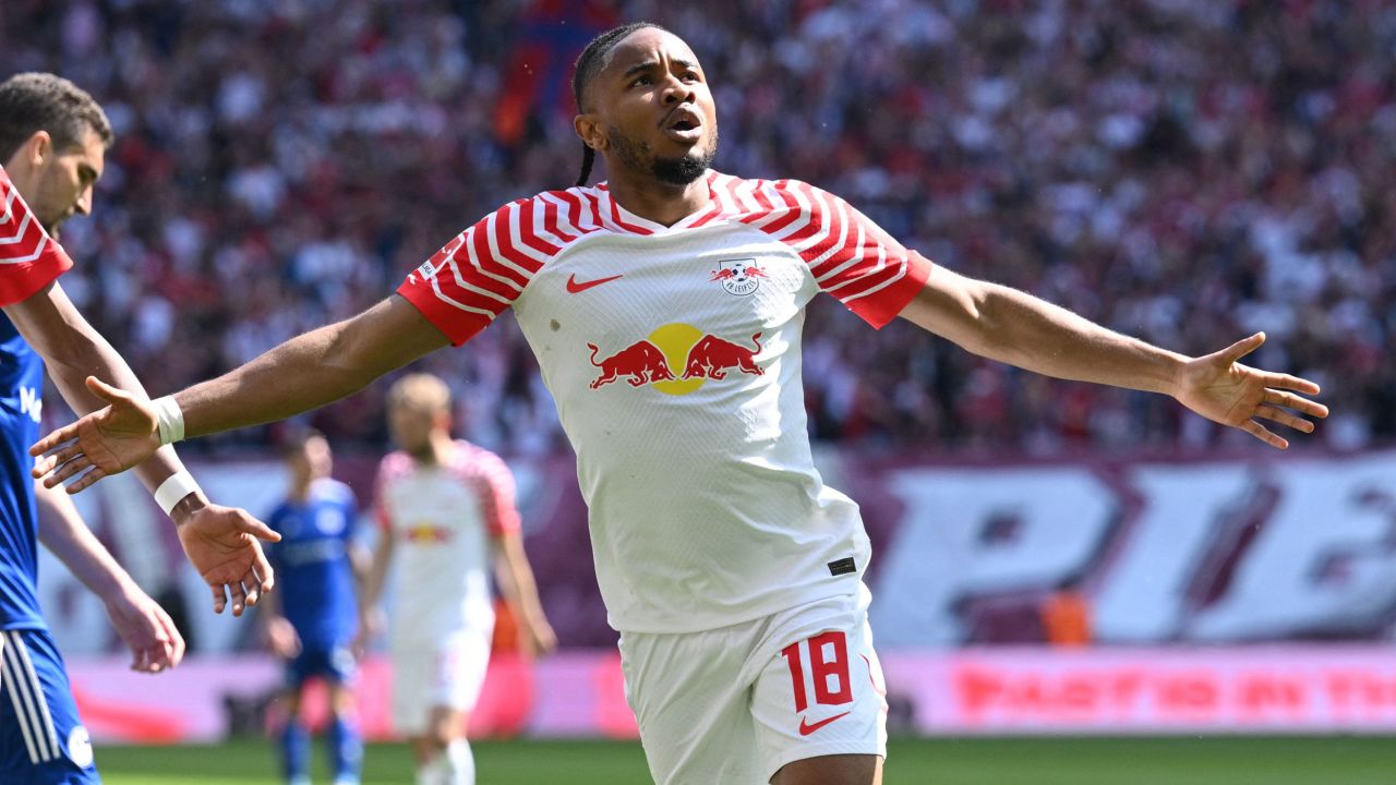Soccer Football - Bundesliga - RB Leipzig v Schalke 04 - Red Bull Arena, Leipzig, Germany - May 27, 2023
RB Leipzig's Christopher Nkunku celebrates scoring their second goal REUTERS/Annegret Hilse DFL REGULATIONS PROHIBIT ANY USE OF PHOTOGRAPHS AS IMAGE SEQUENCES AND/OR QUASI-VIDEO.
