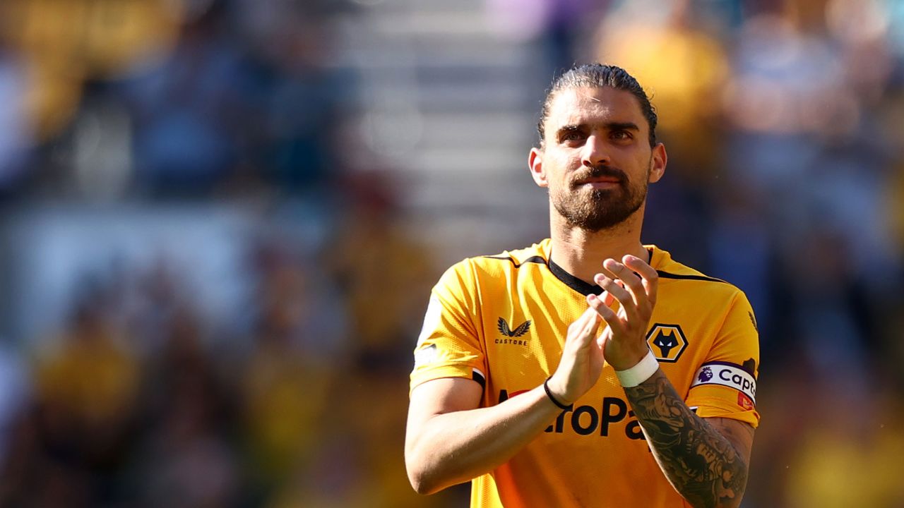 WOLVERHAMPTON, ENGLAND - MAY 20: Ruben Neves of Wolves celebrates on the pitch with his family during the Premier League match between Wolverhampton Wanderers and Everton FC at Molineux on May 20, 2023 in Wolverhampton, England. (Photo by Naomi Baker/Getty Images)