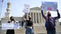 Activists for transgender rights gather in front of the US Supreme Court in Washington, DC, on April 1, 2023.