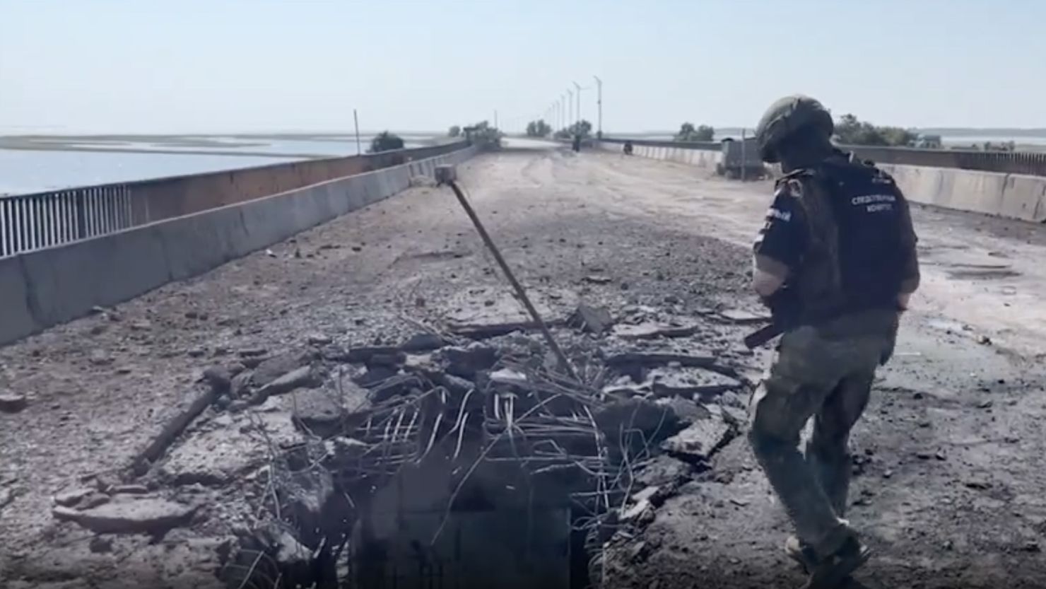 An image taken from a video shows damage to a bridge across the Chonhar Strait, between Kherson region and Crimea, on June 22.