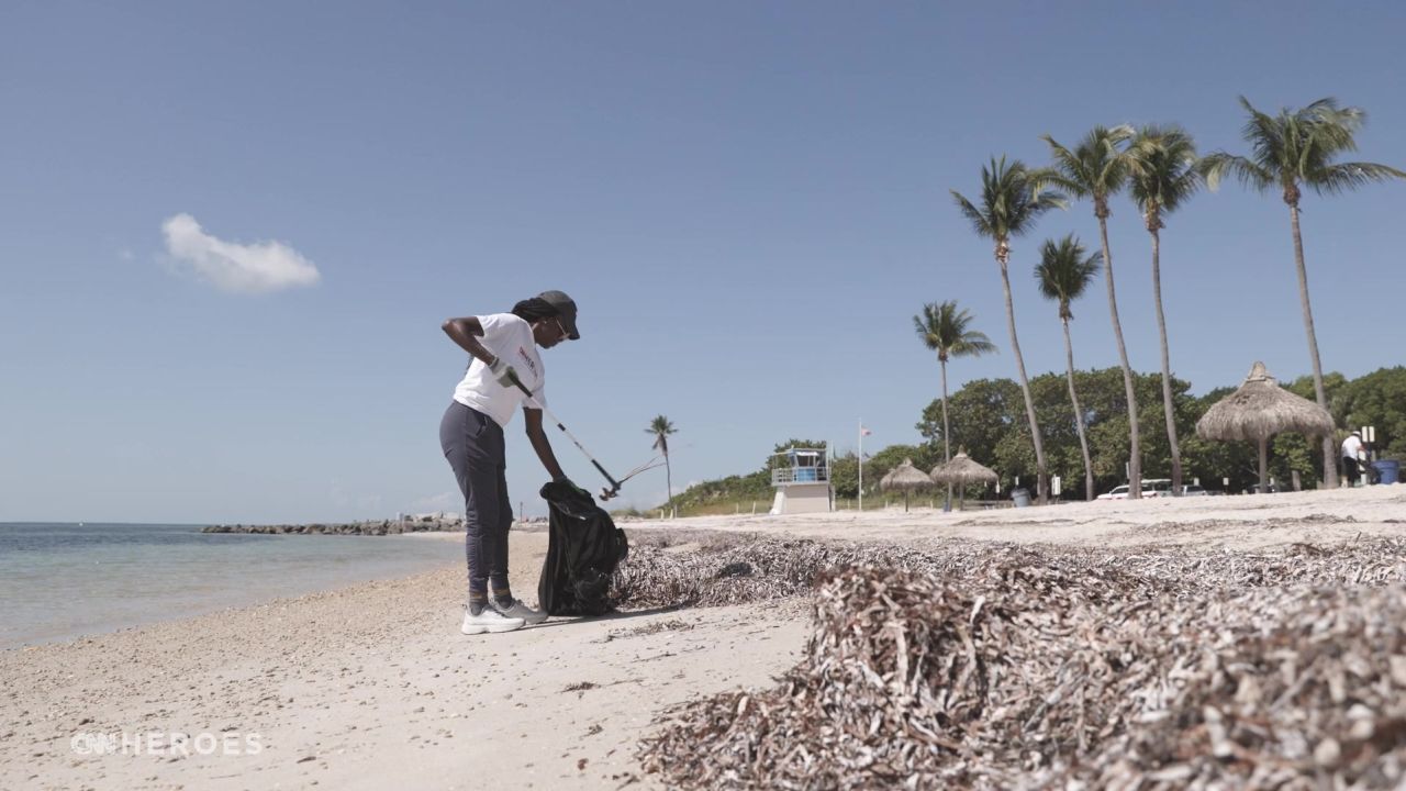 CNN Hero Dr. Ala Stanford picks up beach debris during a service project organized by Miami Waterkeeper