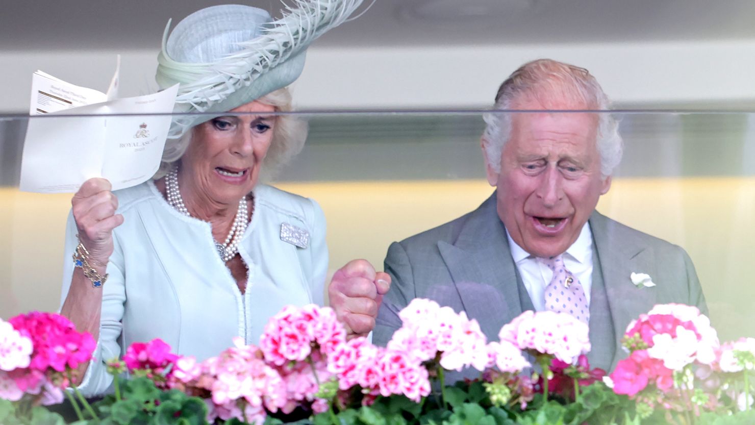 ASCOT, ENGLAND - JUNE 22: King Charles II and Queen Camilla watch their horse Desert Hero win as they attend day three of Royal Ascot 2023 at Ascot Racecourse on June 22, 2023 in Ascot, England. (Photo by Chris Jackson/Getty Images)