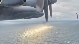 The view from the window of an HC-130J Combat King II search and rescue aircraft at 500 feet over the Atlantic Ocean on June 21, 2023 while the crew searched for a submersible which went missing while diving on the wreck of the Titanic.