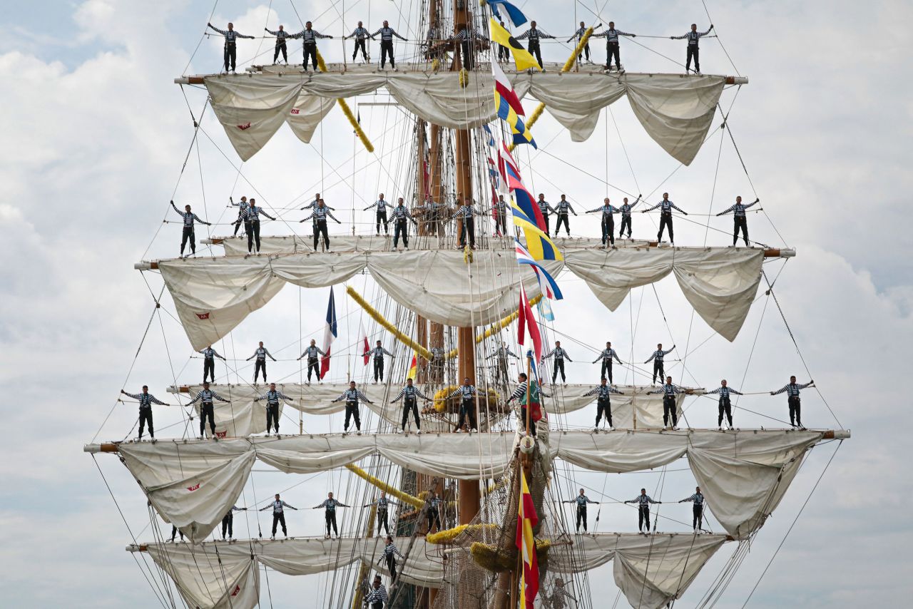 Sailors stand on the sails of the the Cuauhtemoc as the ship leaves at the end of the Rouen Armada event on Sunday, June 18.