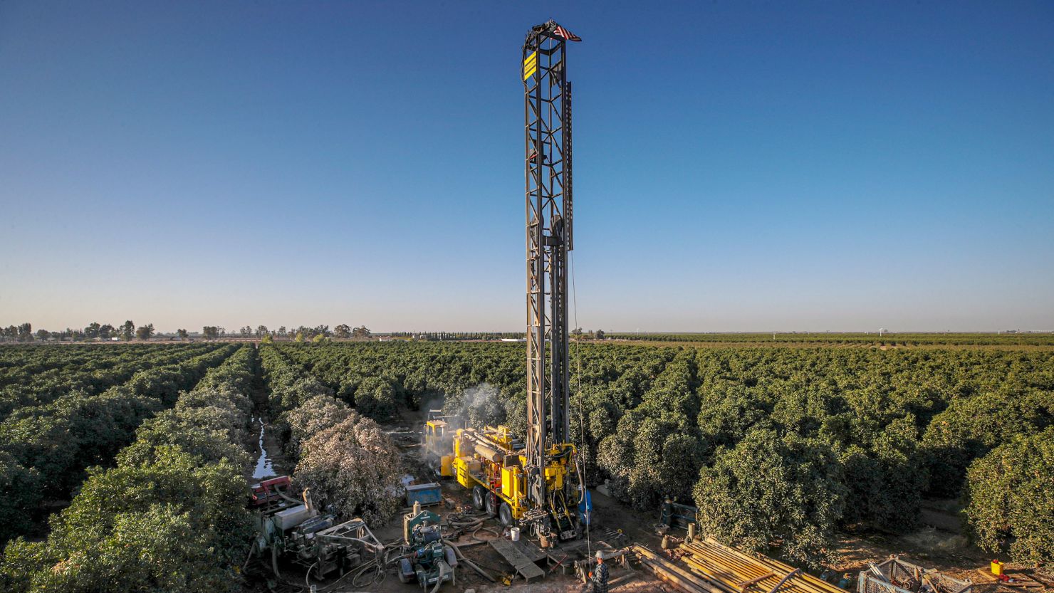 Terra Bella, CA - October 14: Matt Davis's company drills a 1300 feet deep well in an orchard at Setton Farms on Thursday, Oct. 14, 2021 in Terra Bella, CA. (Irfan Khan / Los Angeles Times via Getty Images)
